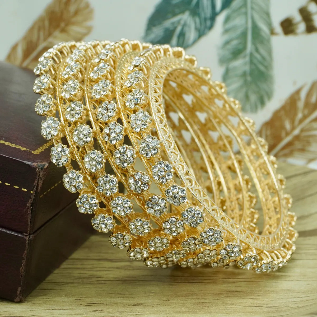 Gold Plated Flower Stone Bangles Set (4 Pieces )
