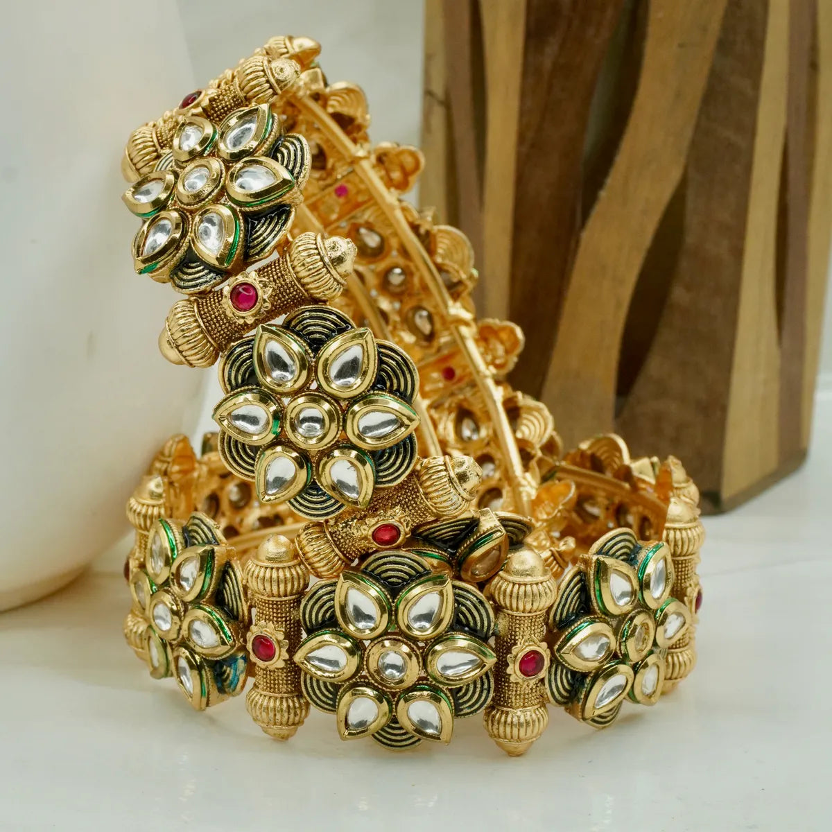 Gold-Plated Kundan Floral Bangle with Green Enamel & Red Stone Accents