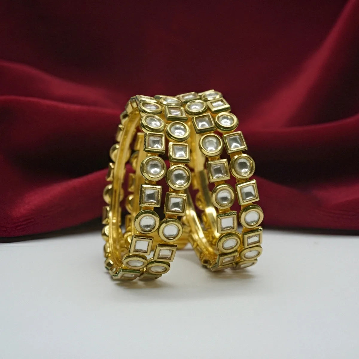 Panini Jewels Gold Plated Mixed Shape Kundan Studded Designer Bangles Set