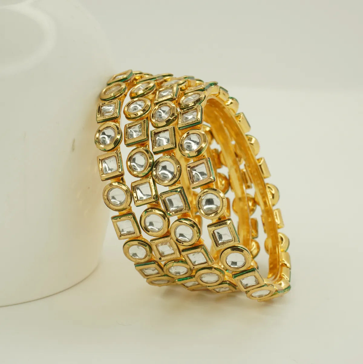 Panini Jewels Gold Plated Mixed Shape Kundan Studded Designer Bangles Set