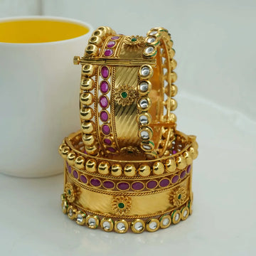Gold-Plated Broad Kada Bangle with Pink Stones & Kundan Detailing
