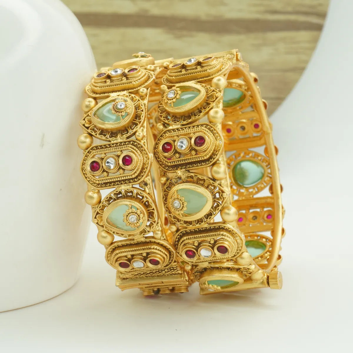 Panini Jewels Gold Plated Antique Finish Stone Studded Designer Bangles Set